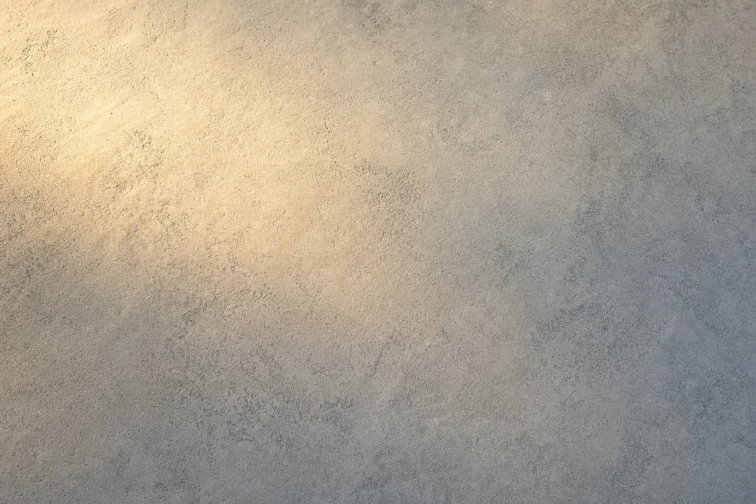 Close-up of a decorative concrete overlay resurfacing layer over existing concrete