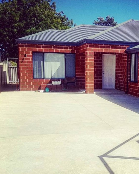 Perth home with liquid limestone concrete drive