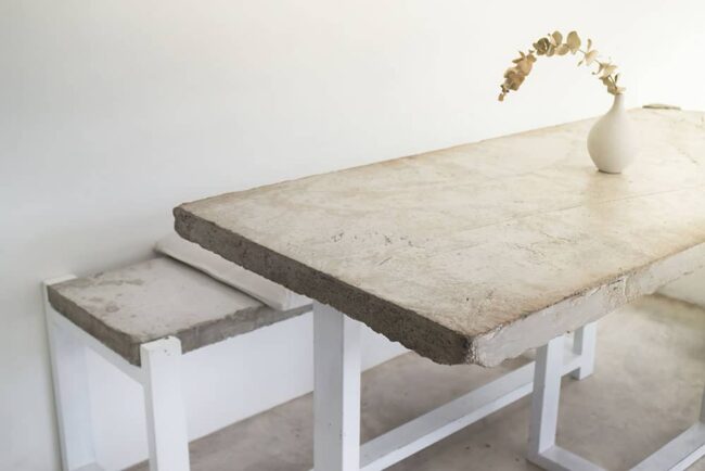 indoor concrete dining table and bench