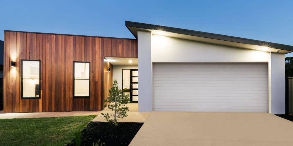 Modern home with liquid limestone driveway.